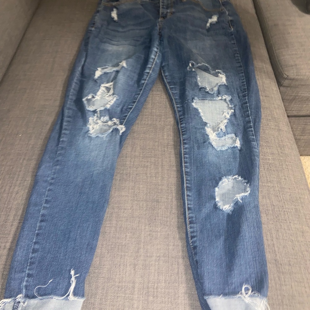 Dark blue ripped jeans